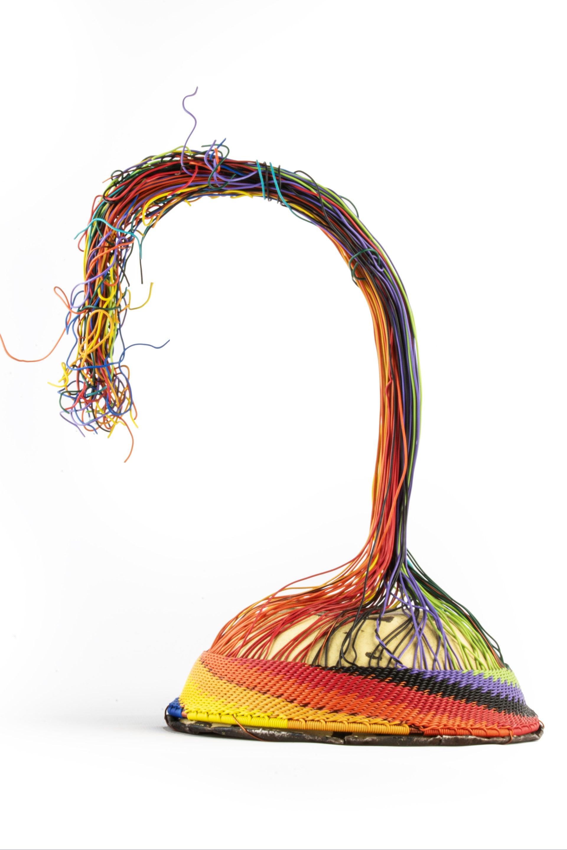 upside down wire bowl in process of production showing colorful wires